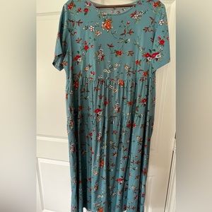 Teal patterned dress.